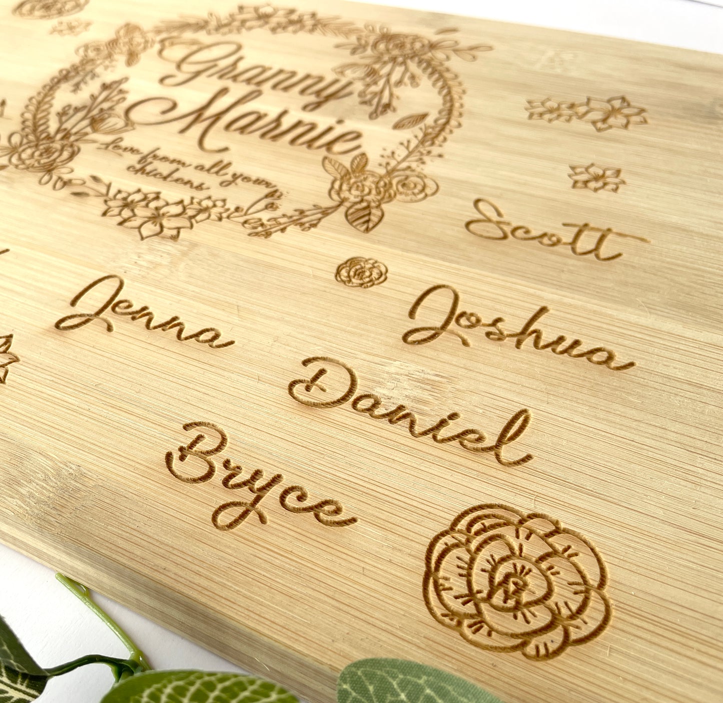 Personalized Wreath cutting board with names engraved around board