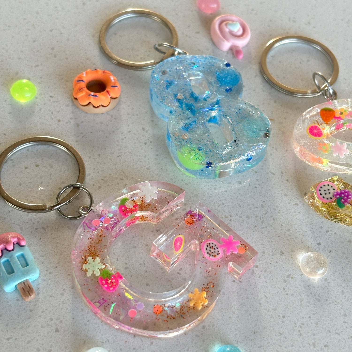 Personalized resin keyrings in any letter or number