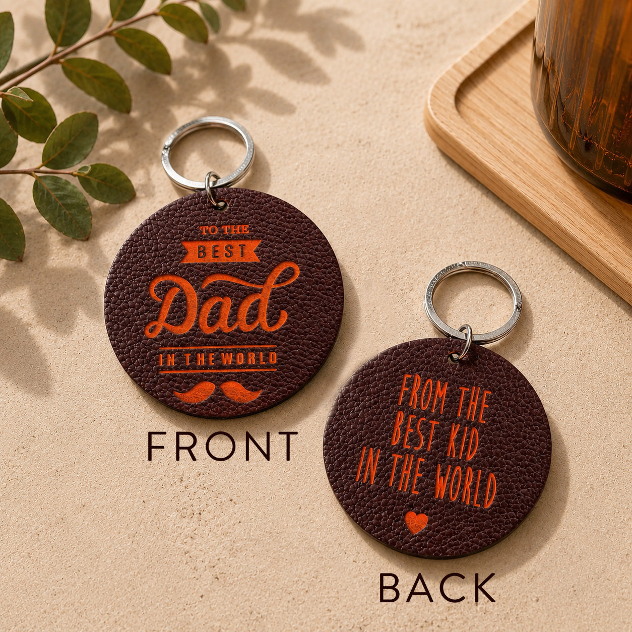Engraved leather keyring with orange contrast