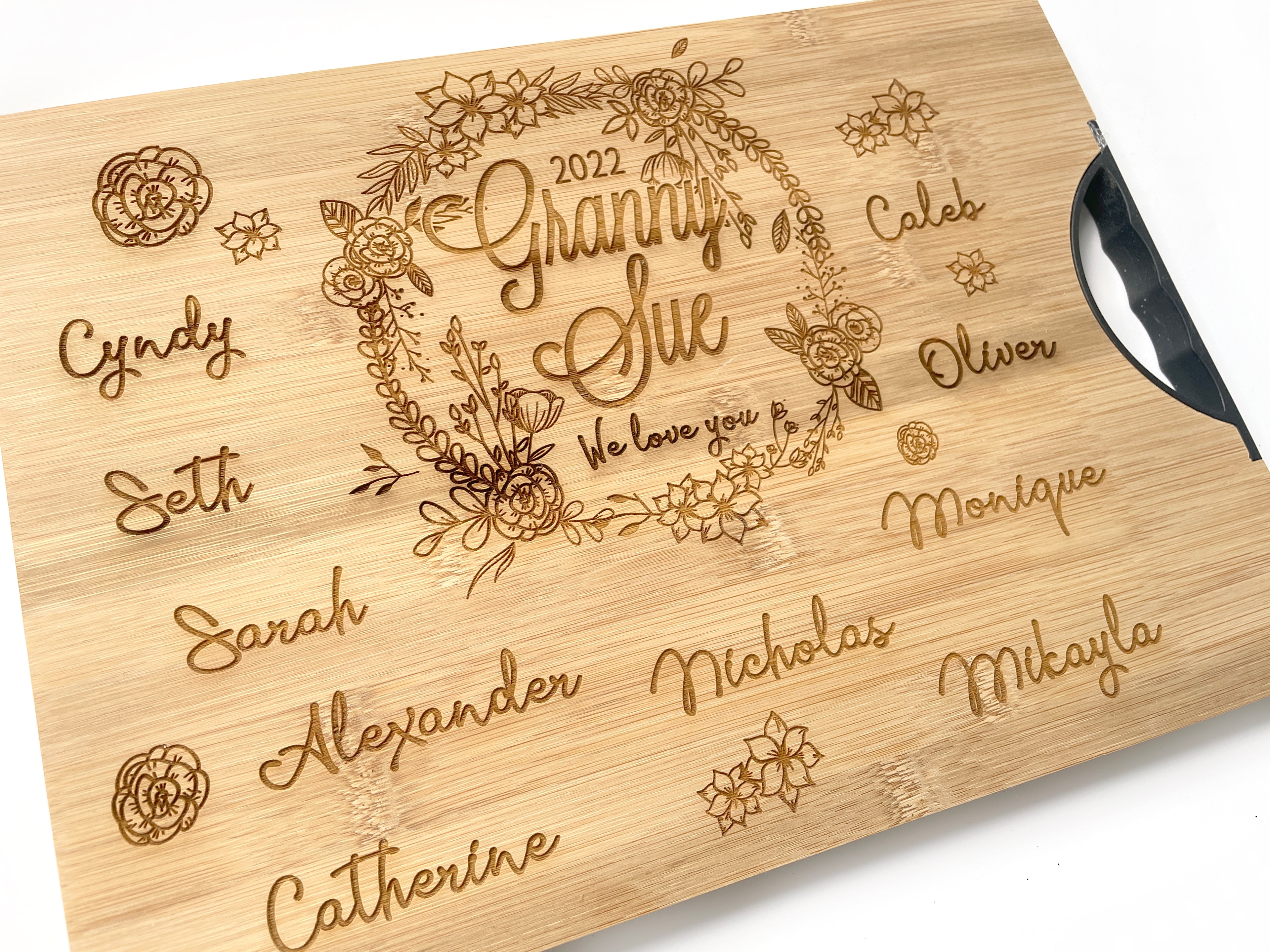 Personalized Wreath cutting board with names engraved around board