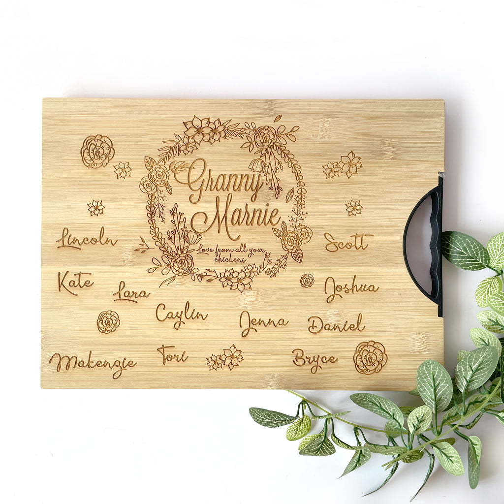 Personalized Wreath cutting board with names engraved around board