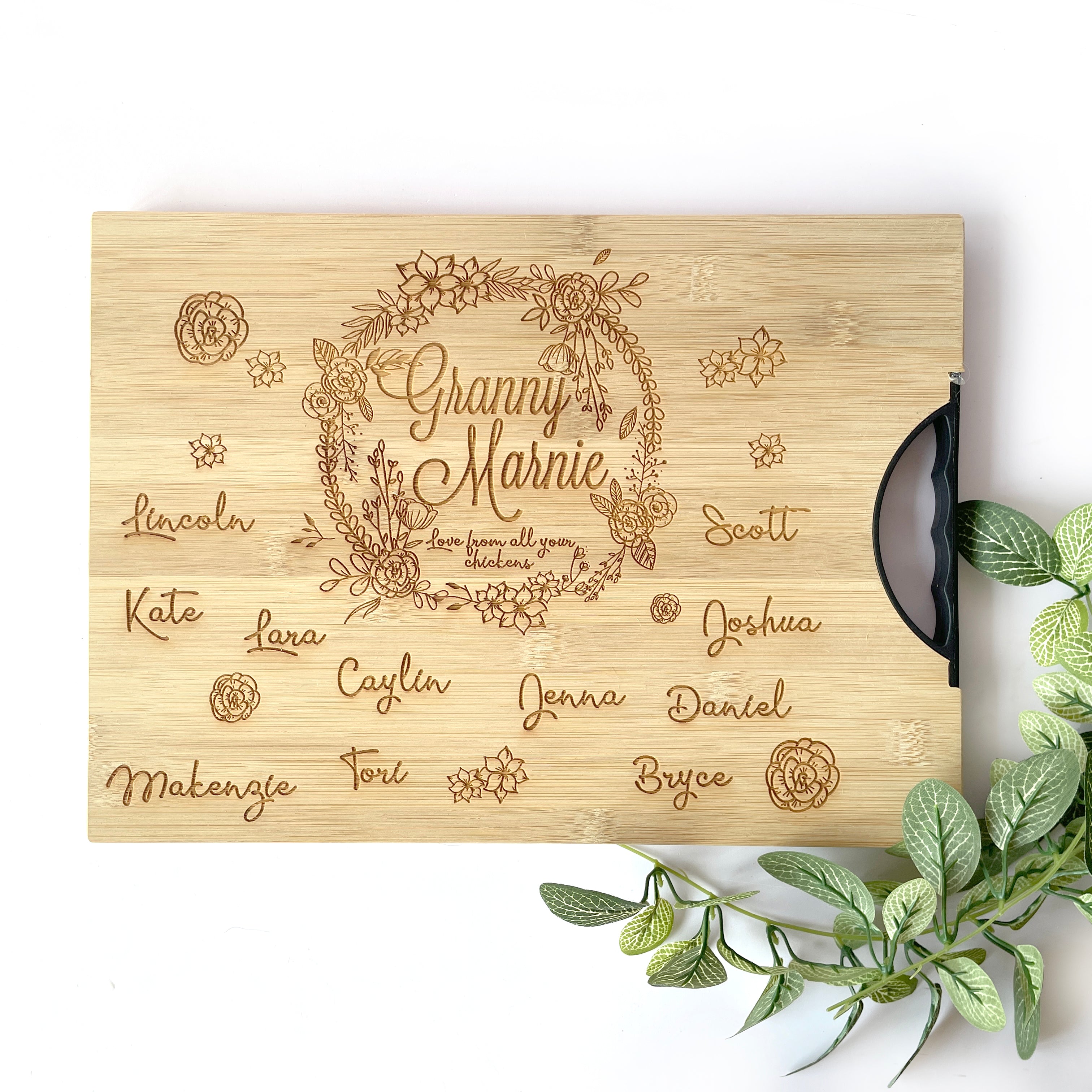 Personalized Wreath cutting board with names engraved around board