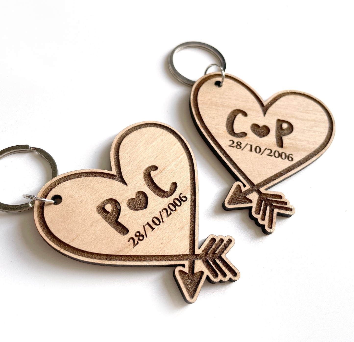 A pair of Heart Keyrings - Personalised with initials and date